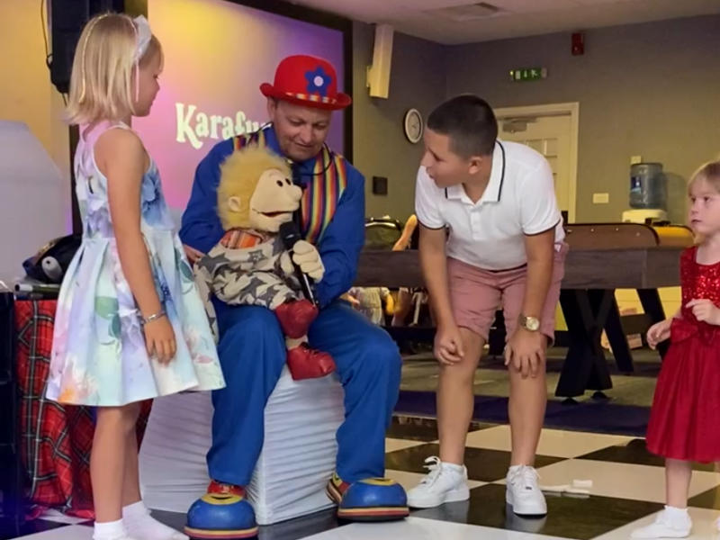 Mr Bumble performing at a kids at a Communion in Glasgow